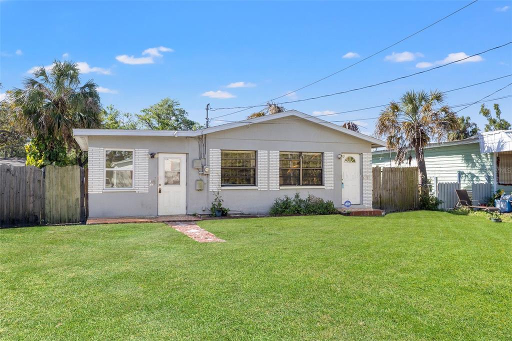 3256 Roxborough Avenue Clearwater, FL 33762 - Photo 1 of 1 front view of a house and a yard