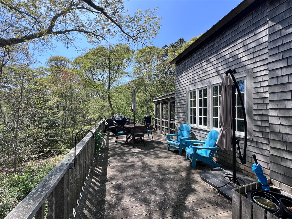 225 Lamberts Cove Road West Tisbury, MA 02568 - Photo 16 of 33 a view of sitting area with furniture in backyard