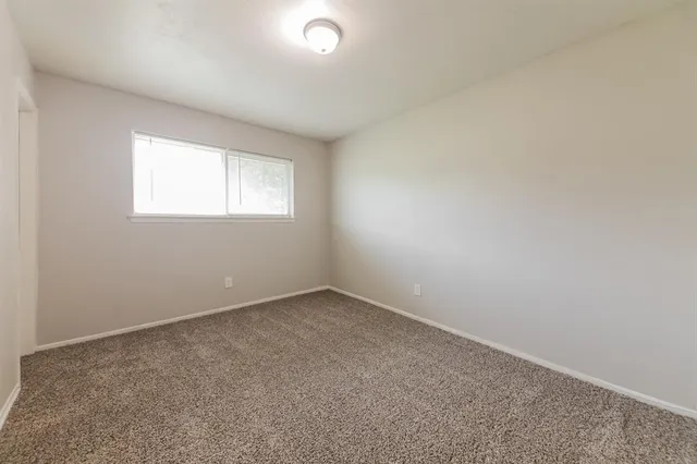 an empty room with a window