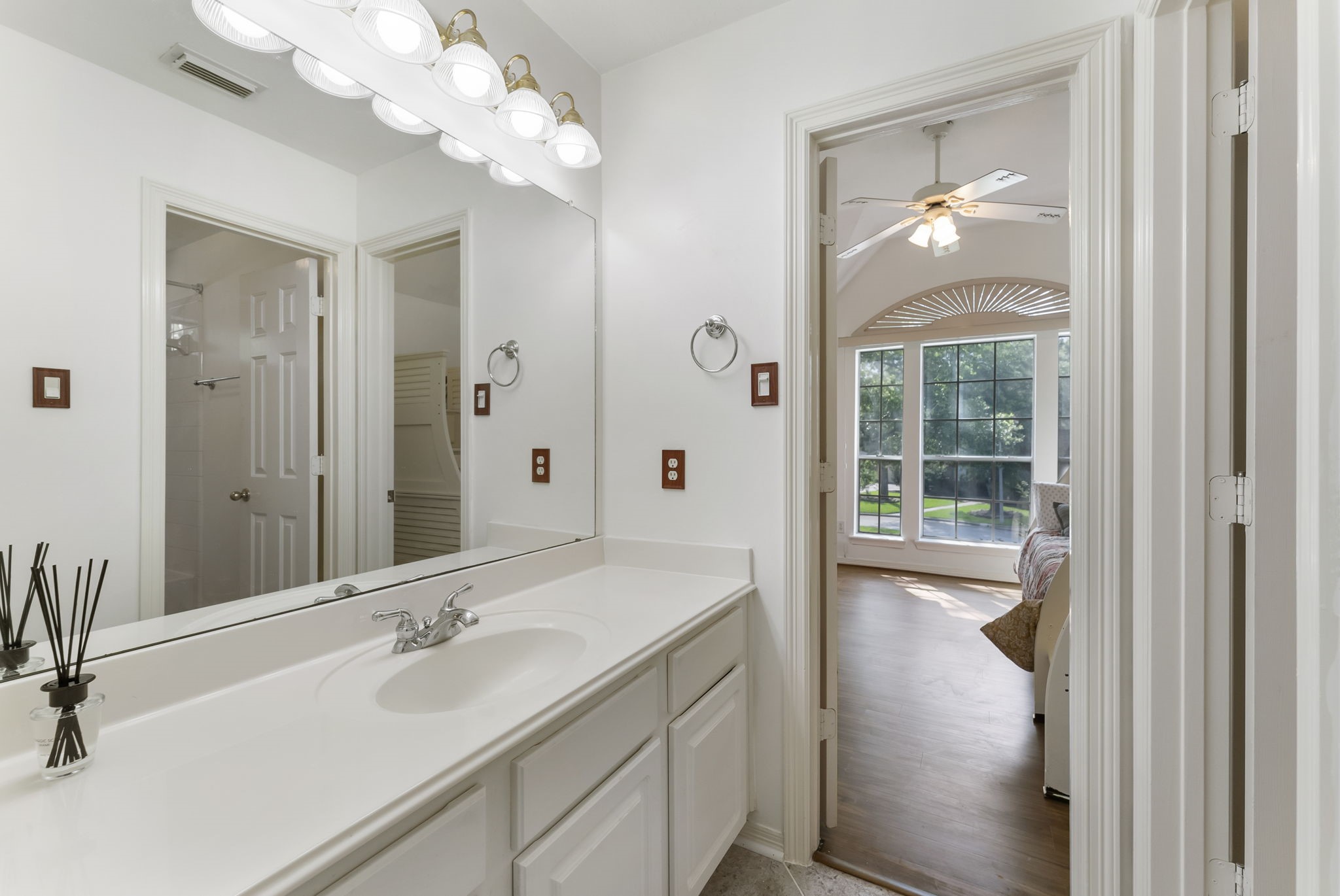 12907 Ryaneagles Circle Houston, TX 77044 - Photo 37 of 48 a bathroom with a sink vanity tub and shower