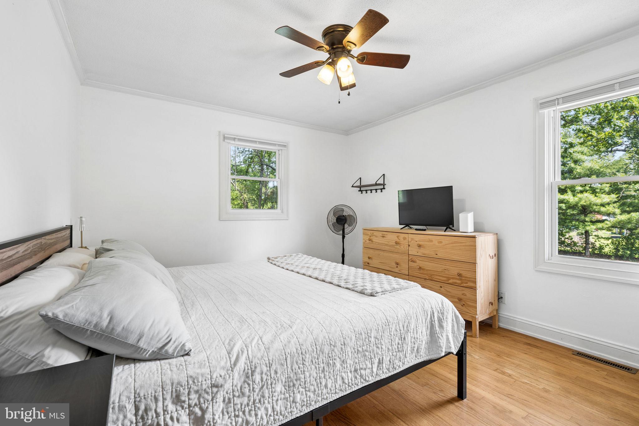 12237 Randle Lane Culpeper, VA 22701 - Photo 13 of 31 a bedroom with a bed and a tv