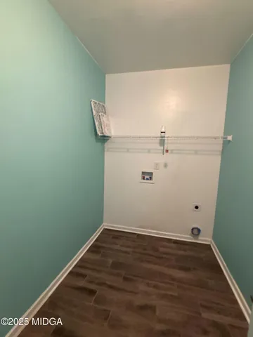 a view of small space with racks on the wall