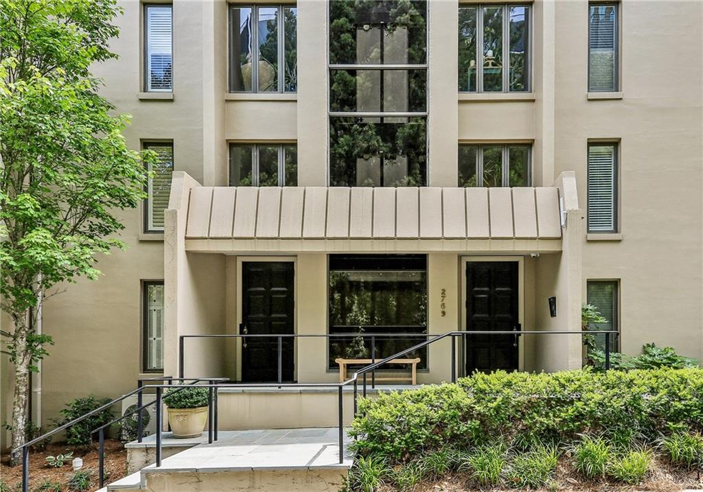 2769 Peachtree Road Northeast, Unit 2 Atlanta, GA 30305 - Photo 2 of 5 a house view with a garden space