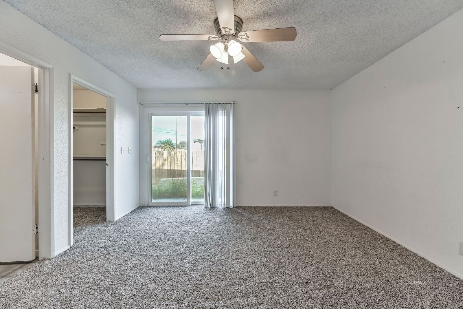 932 West St George Avenue Ridgecrest, CA 93555 - Photo 22 of 28 a view of an empty room with a window