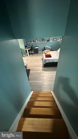 a bed room with a bed and furniture