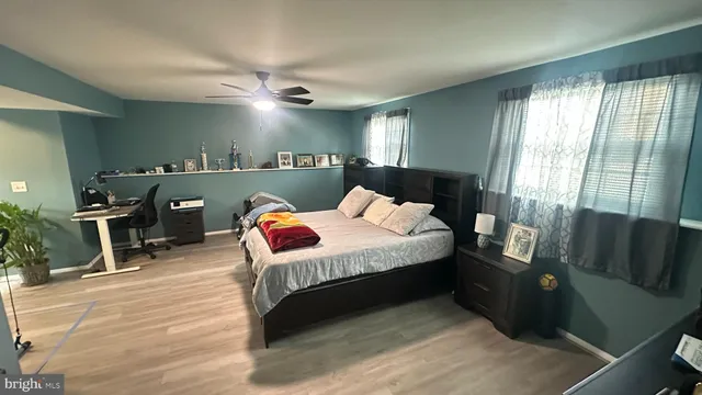 a view of a workspace with furniture and a workspace