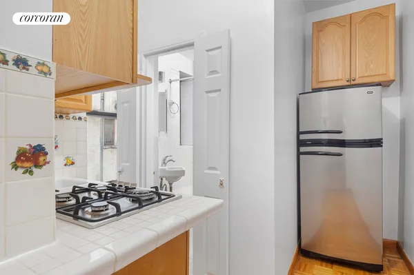 a view of a sink and storage area