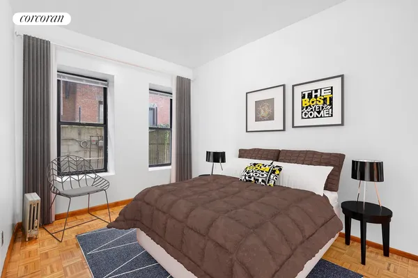 a bedroom with a bed and glass window