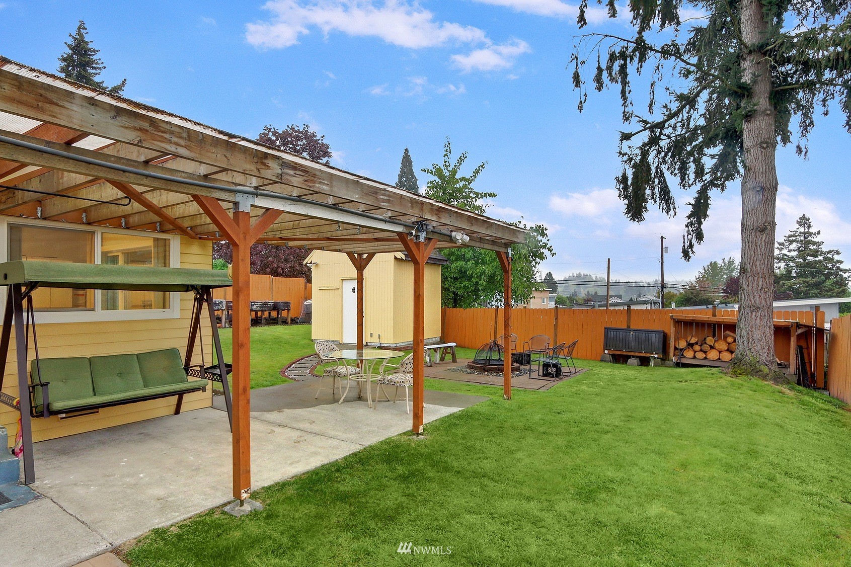 2209 Northeast 8th Street Renton, WA 98056 - Photo 16 of 24 a view of a backyard with a patio