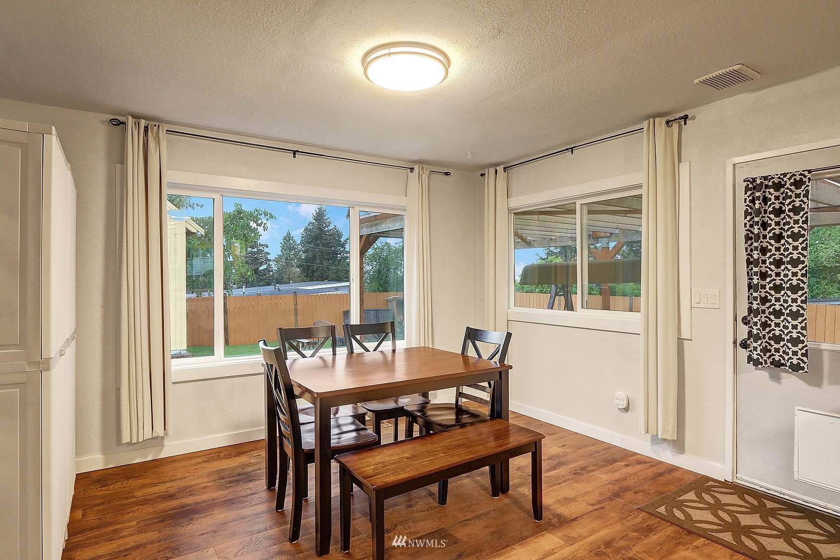 2209 Northeast 8th Street Renton, WA 98056 - Photo 6 of 24 a dining room with furniture and window