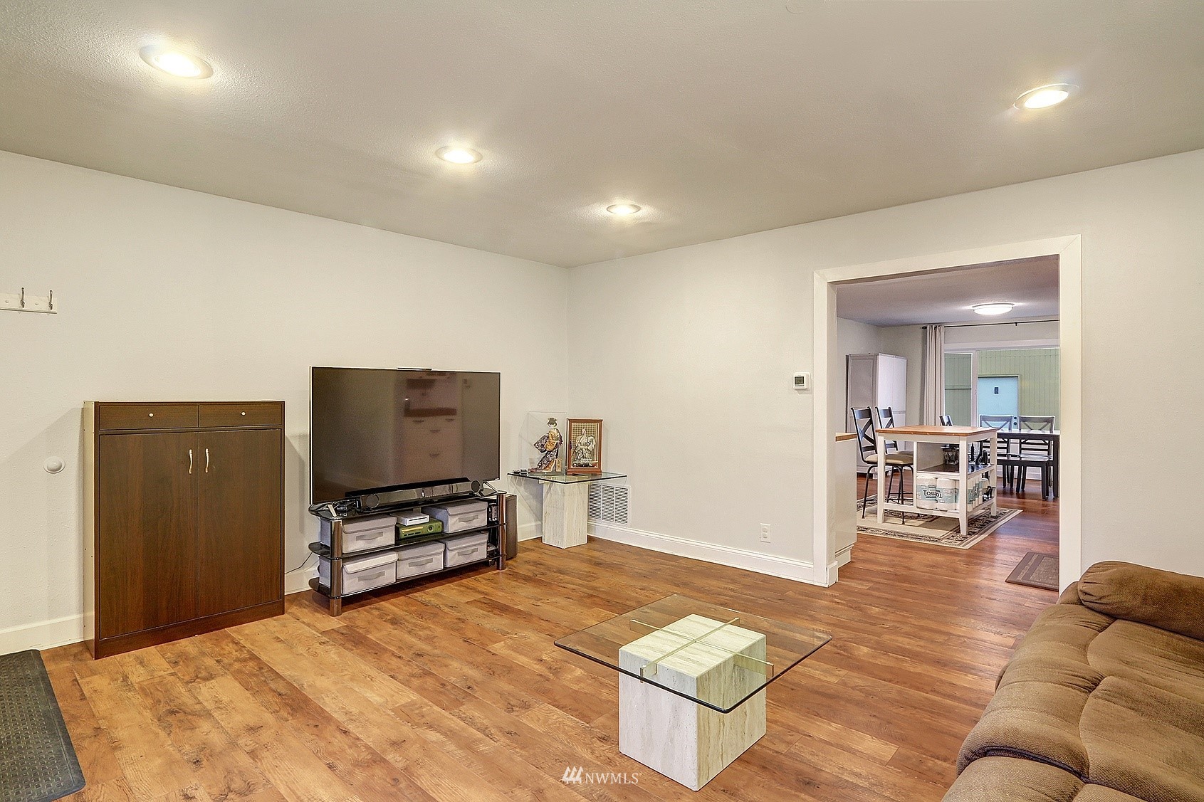 2209 Northeast 8th Street Renton, WA 98056 - Photo 7 of 24 a living room with furniture and a flat screen tv