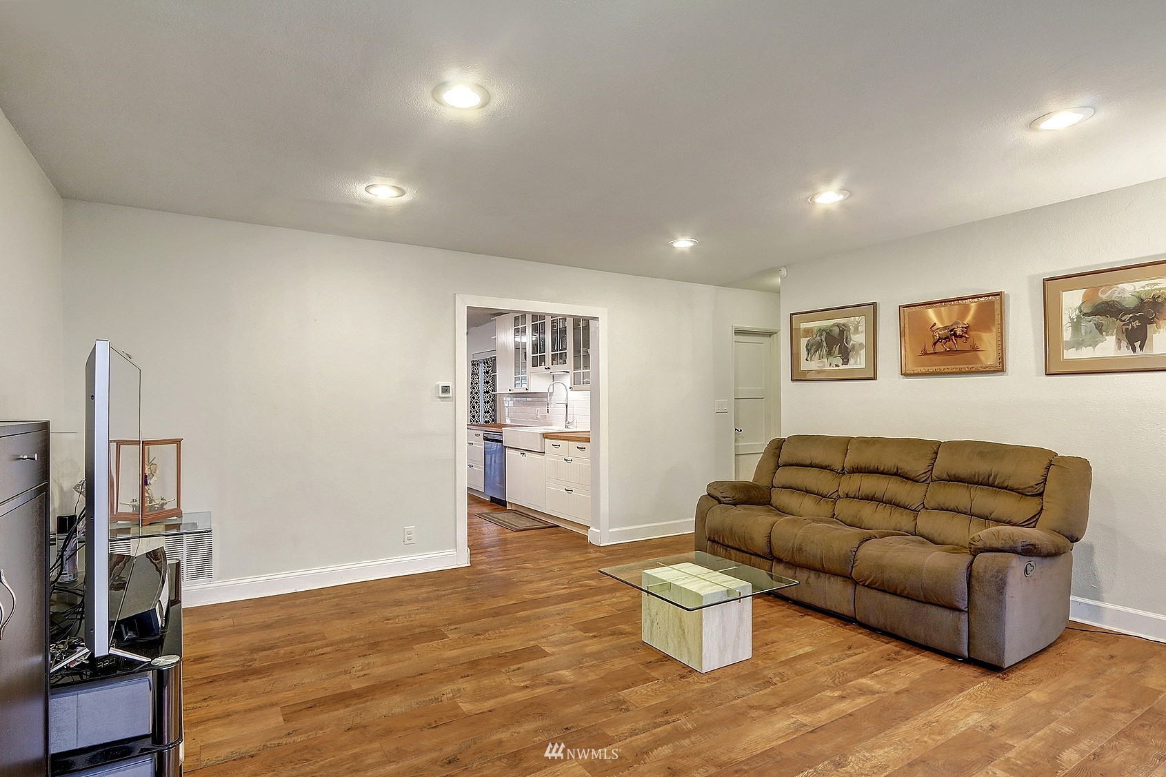 2209 Northeast 8th Street Renton, WA 98056 - Photo 9 of 24 a living room with furniture and a flat screen tv