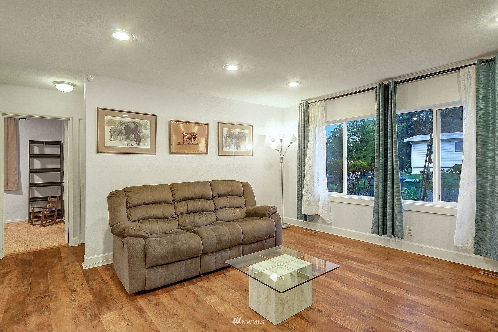 2209 Northeast 8th Street Renton, WA 98056 - Photo 10 of 24 a living room with furniture and a large window