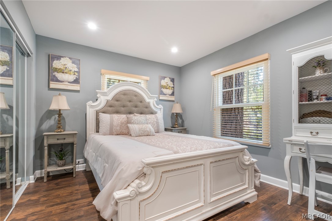 195 Elgin Road Big Bear Lake, CA 92315 - Photo 11 of 45 a bedroom with a large bed and a window