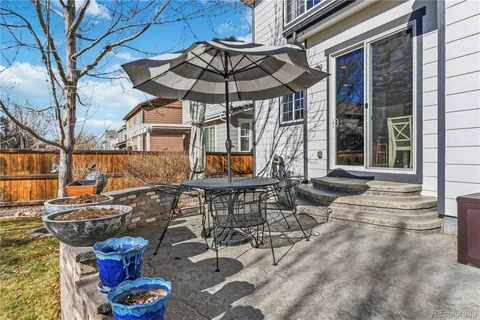 a backyard of a house with seating space