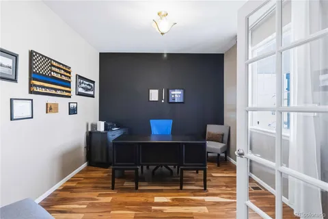 a view of a livingroom with furniture and wooden floor