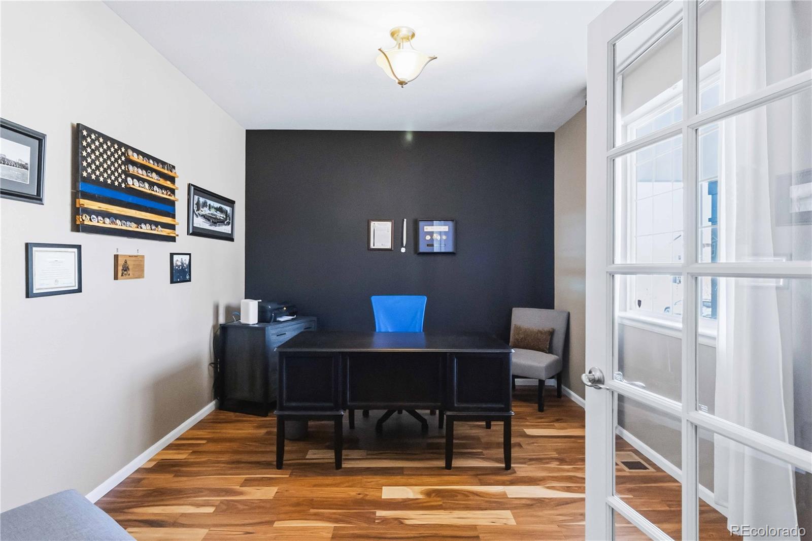 14144 Greenfield Loop Parker, CO 80134 - Photo 5 of 50 a workspace with furniture and window