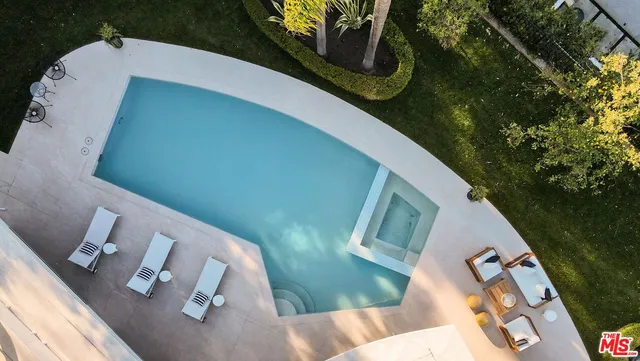 a outdoor living space with furniture and garden view