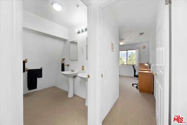 a bathroom with a sink and toilet