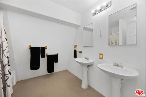 a view of entryway with wooden walls