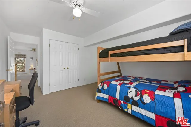 a front view of a house with parking space