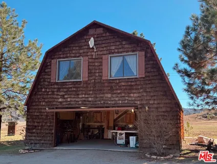 a view of a garage with storage