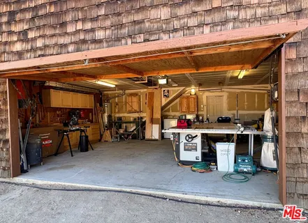 a view of a garage with storage