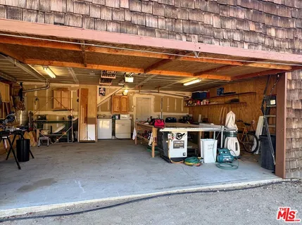 a view of swimming pool with a lake view