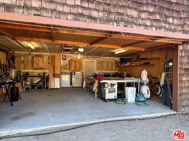 a view of swimming pool with a lake view