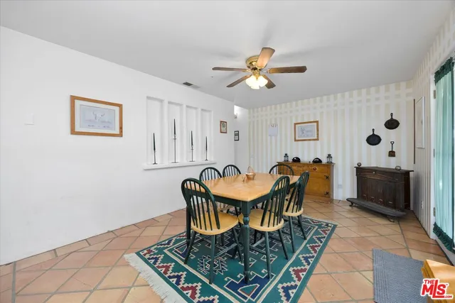 a kitchen with a refrigerator a sink and dishwasher
