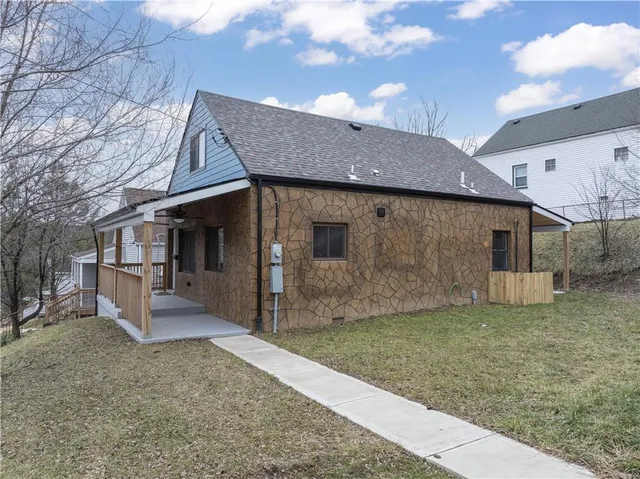 a picture of a bathroom with a shower