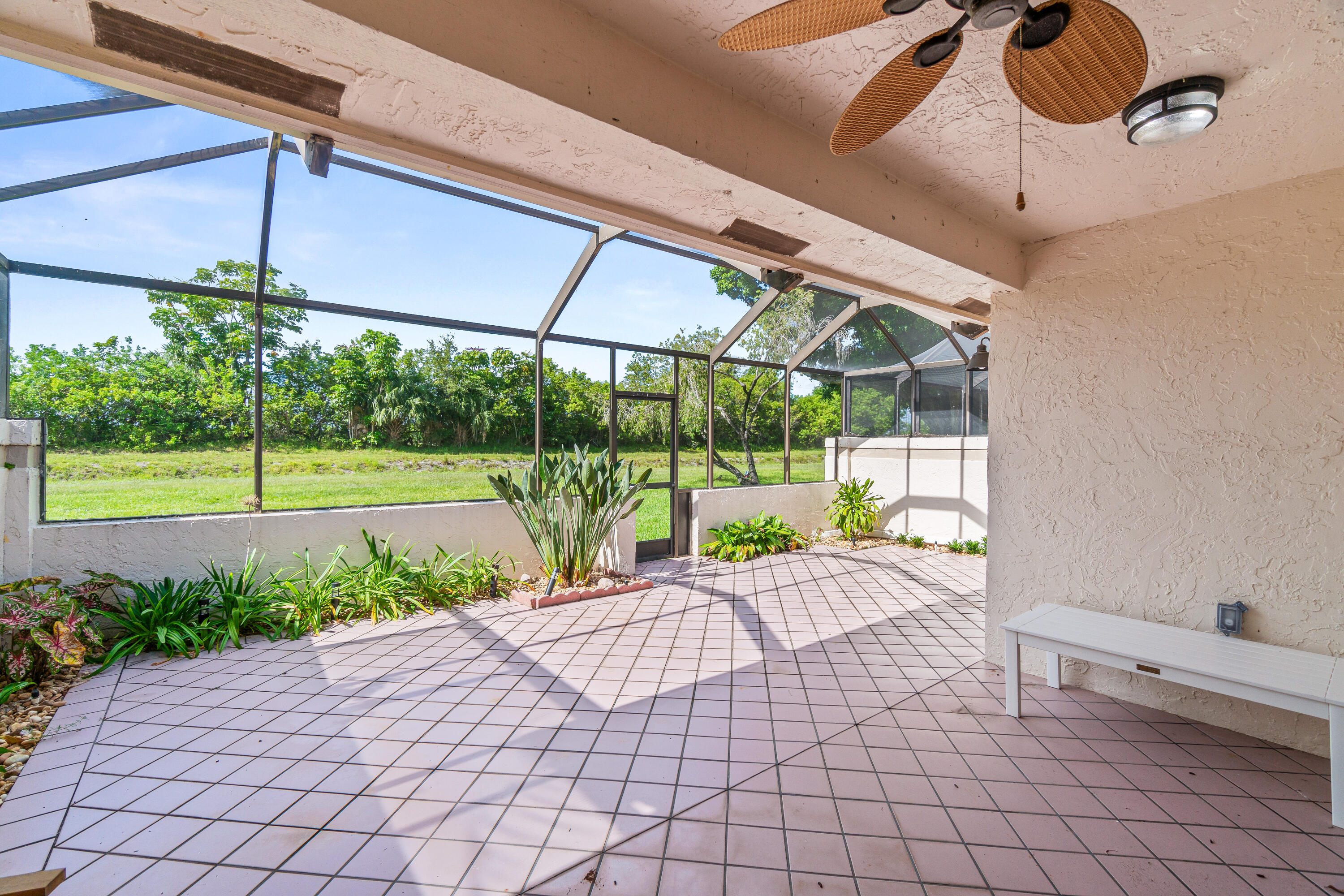 20021 Mona Circle Boca Raton, FL 33434 - Photo 29 of 42 20021 Mona Circle south facing screened