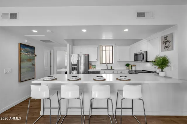 a view of a dining room with furniture