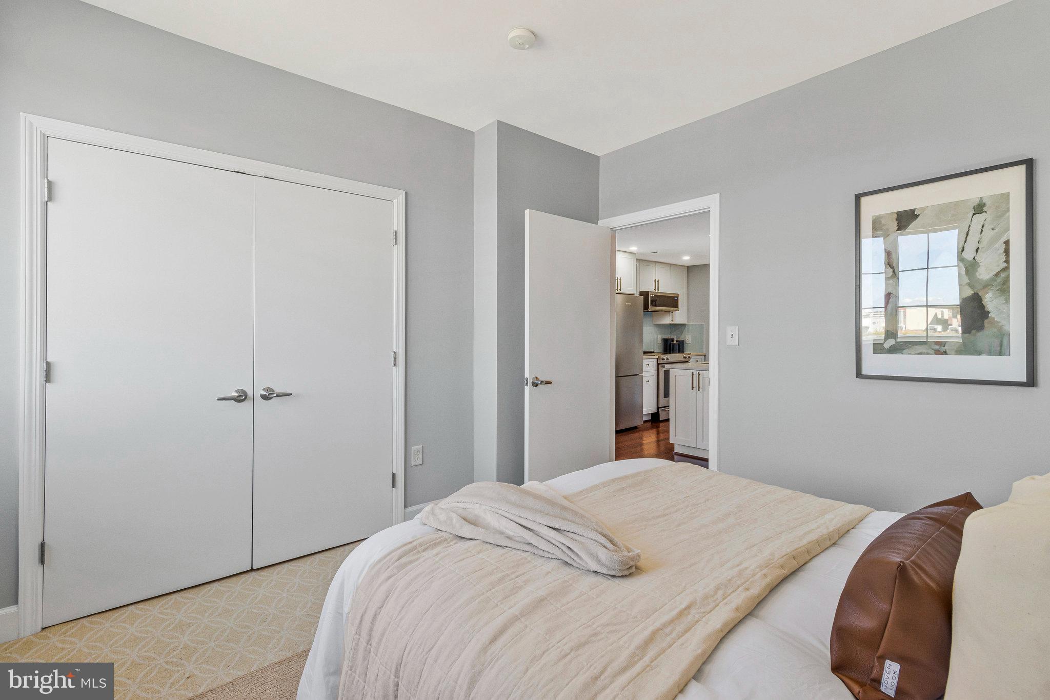 150 V Street Northwest, Unit V402 Washington, DC 20001 - Photo 12 of 28 Large, and bright primary bedroom