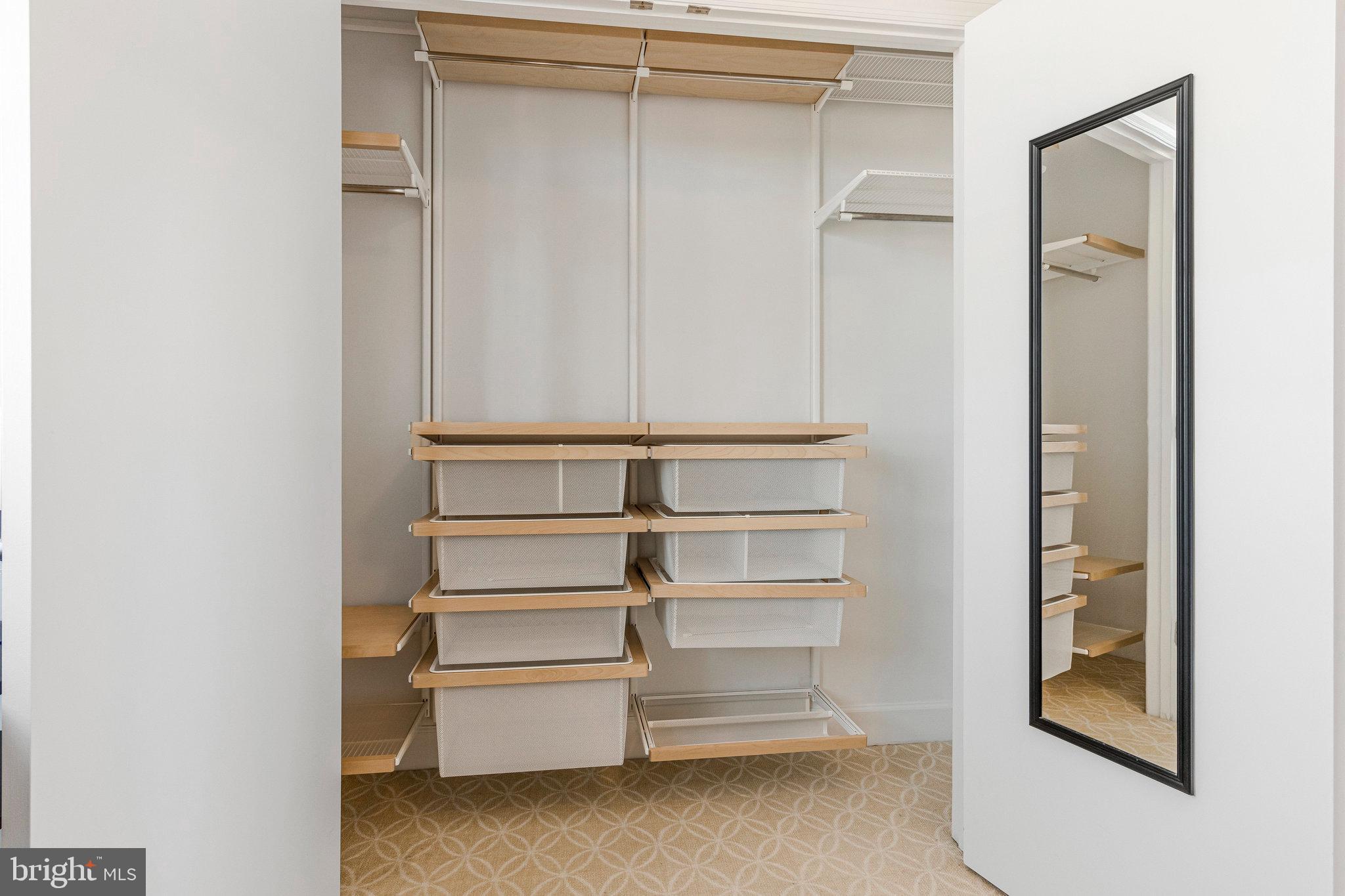 150 V Street Northwest, Unit V402 Washington, DC 20001 - Photo 14 of 28 Custom closet system in primary bedroom