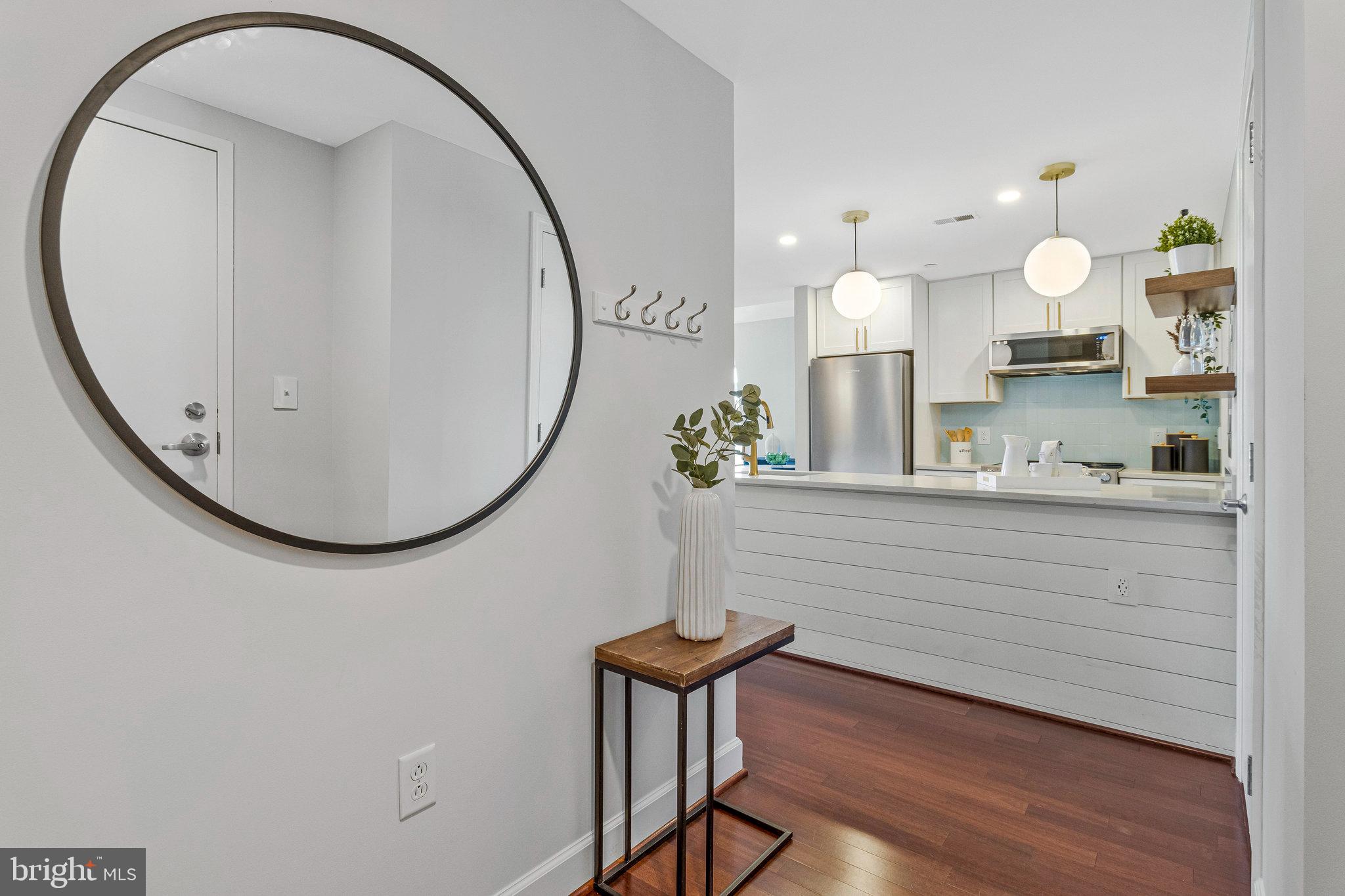 150 V Street Northwest, Unit V402 Washington, DC 20001 - Photo 2 of 28 Entrance with kitchen in background