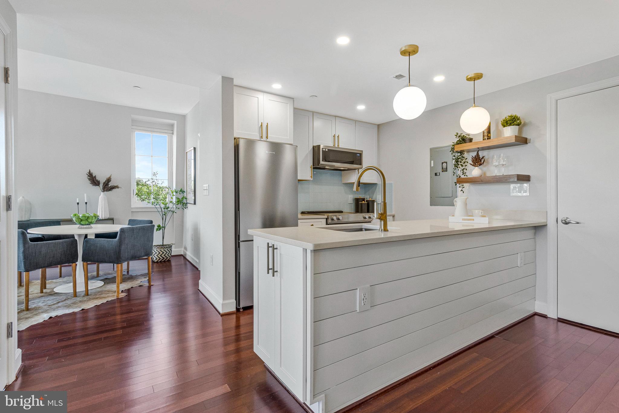 150 V Street Northwest, Unit V402 Washington, DC 20001 - Photo 6 of 28 Kitchen with dining area