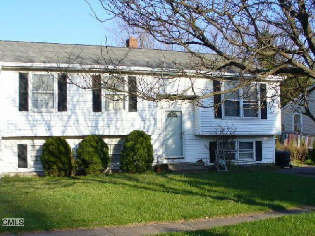 82 Robertson Road Hamden, CT 06518 - Photo 1 of 1 a view of a house with a garden