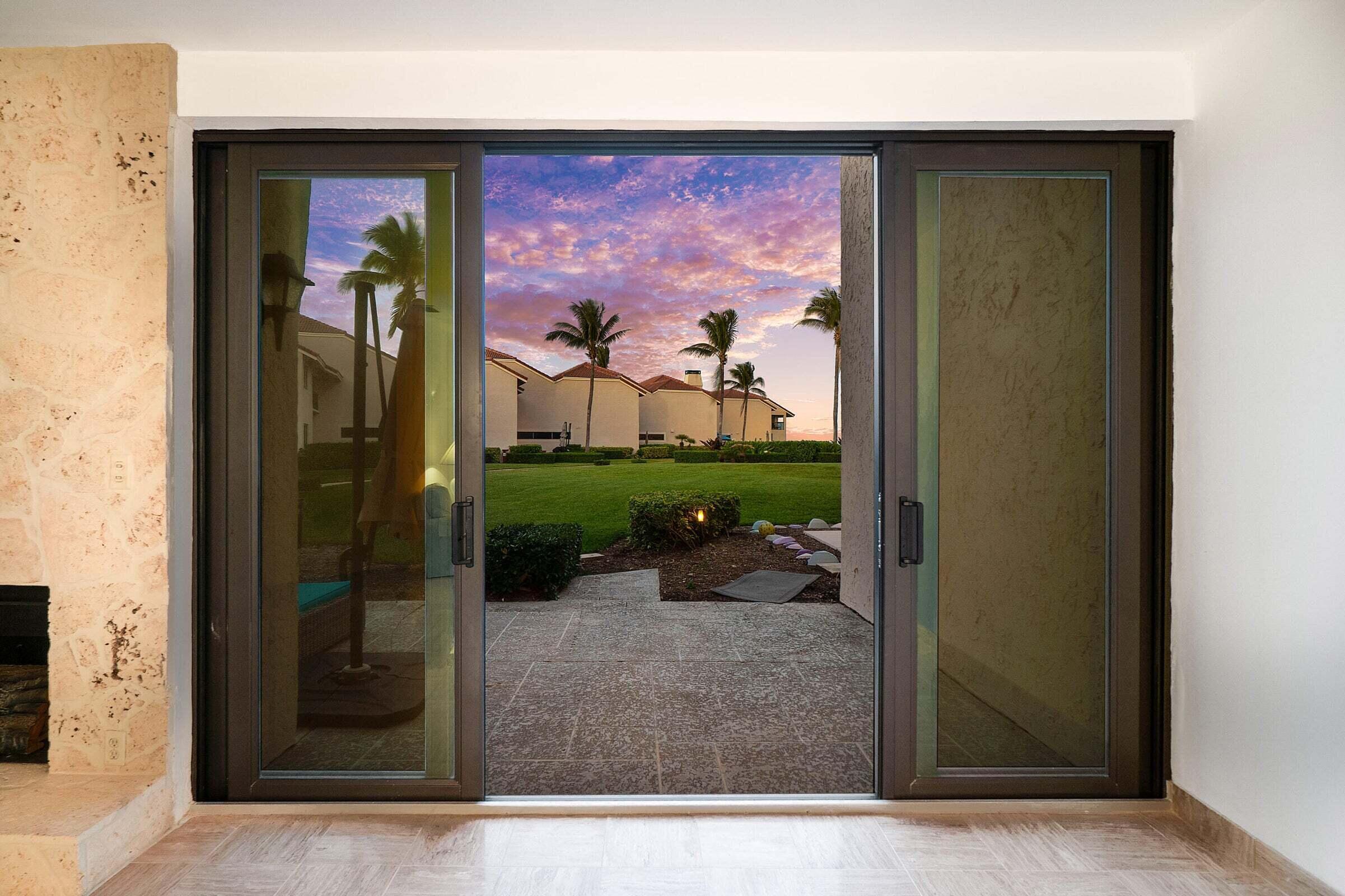 6711 North Ocean Boulevard, Unit 13 Ocean Ridge, FL 33435 - Photo 14 of 50 a view of a entryway door front of house