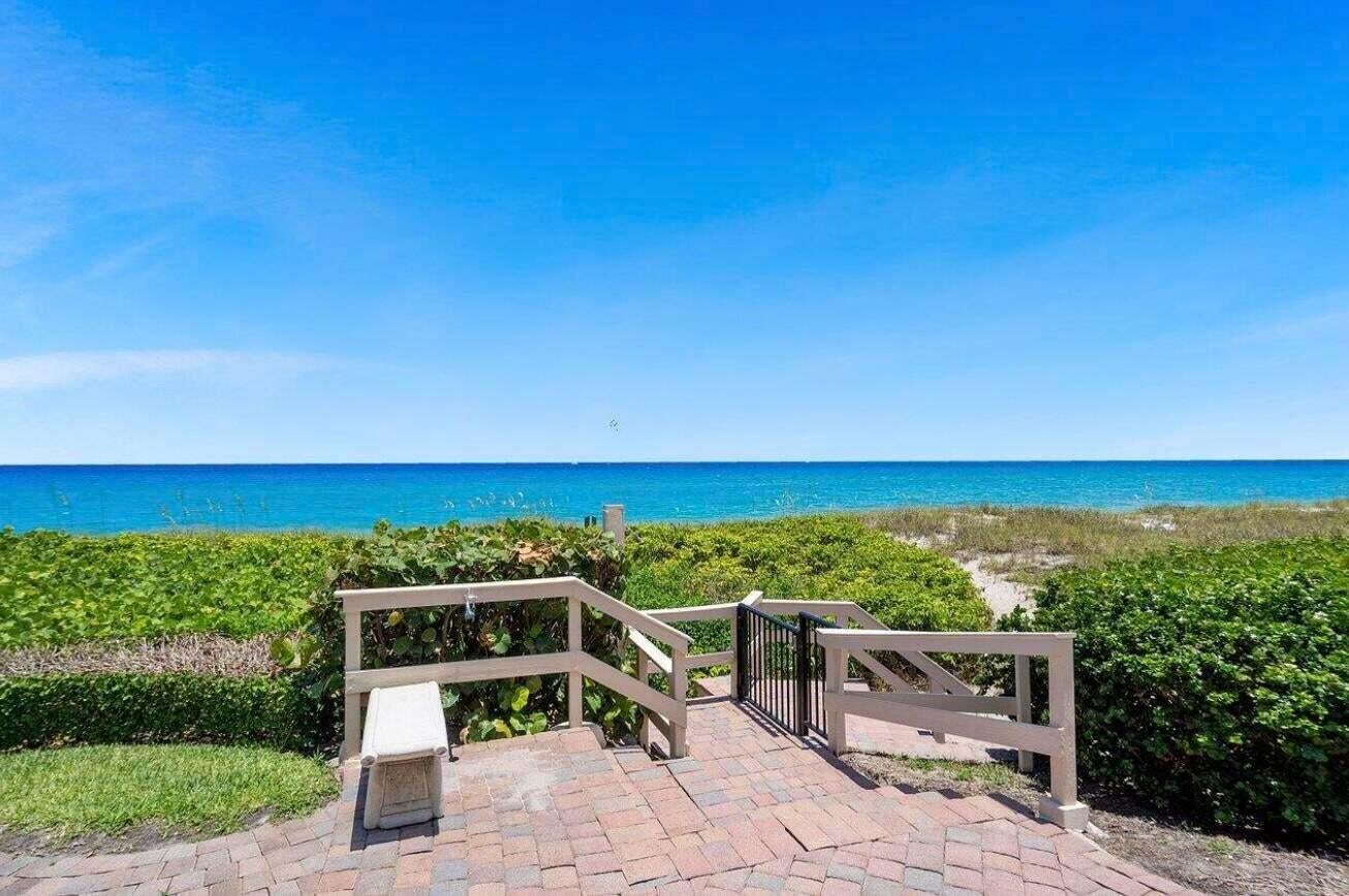 6711 North Ocean Boulevard, Unit 13 Ocean Ridge, FL 33435 - Photo 40 of 50 a view of a city from a balcony
