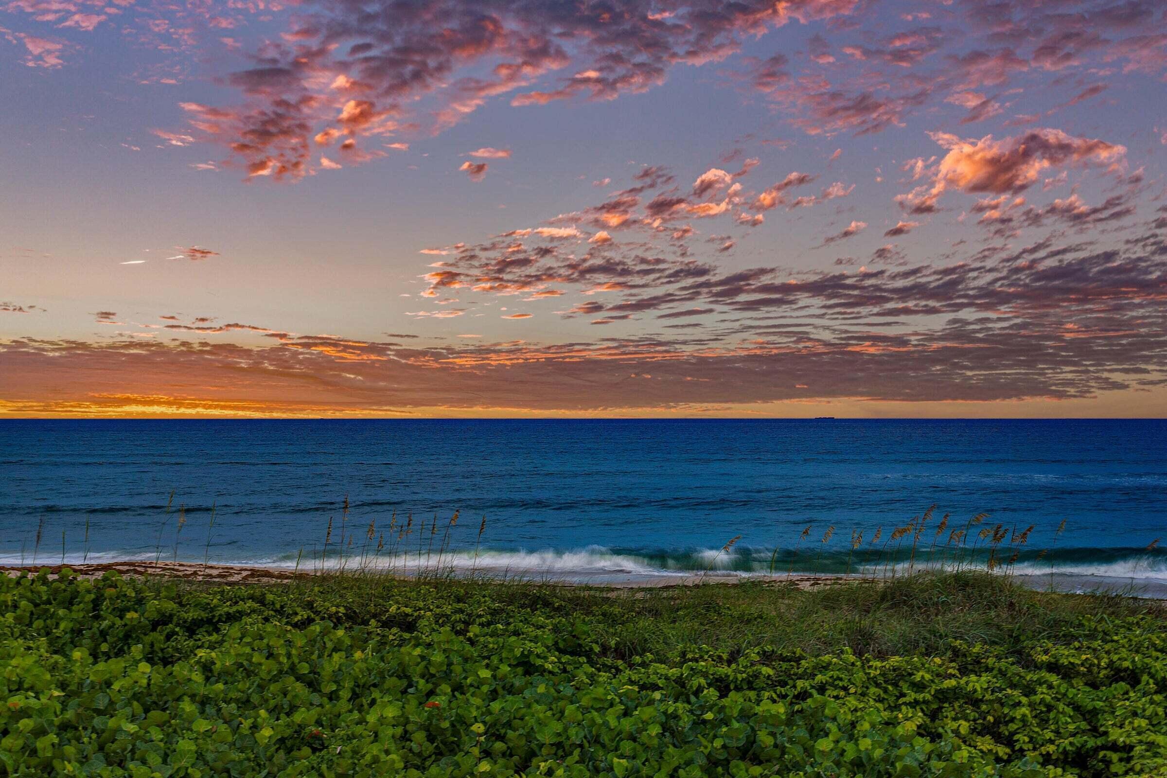 6711 North Ocean Boulevard, Unit 13 Ocean Ridge, FL 33435 - Photo 41 of 50 a view of an ocean and beach