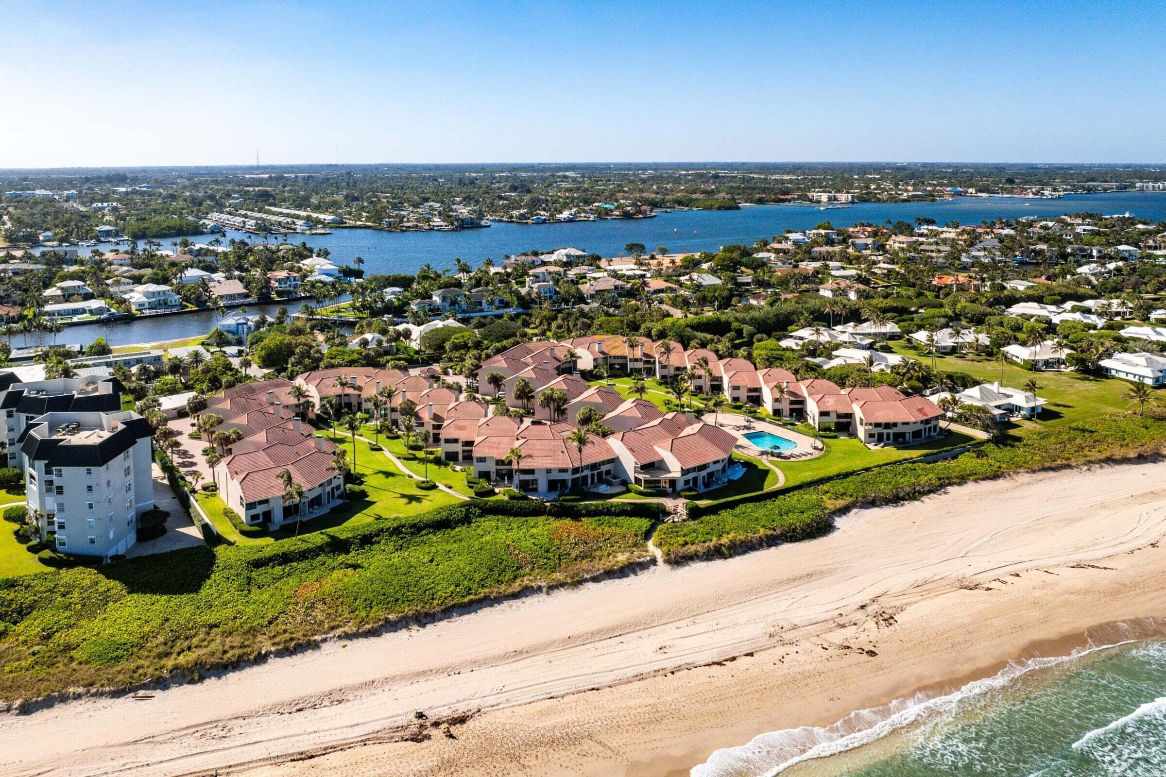 6711 North Ocean Boulevard, Unit 13 Ocean Ridge, FL 33435 - Photo 50 of 50 an aerial view of a city with lots of residential buildings