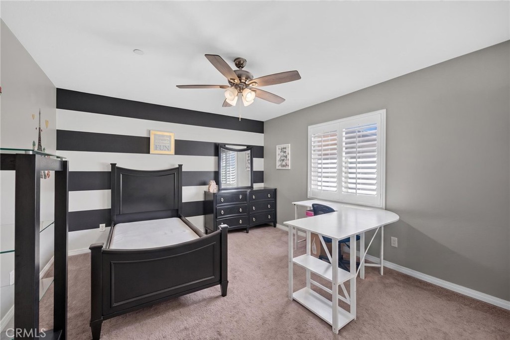 23347 Crystal Way Wildomar, CA 92595 - Photo 69 of 109 a living room with furniture and a large window