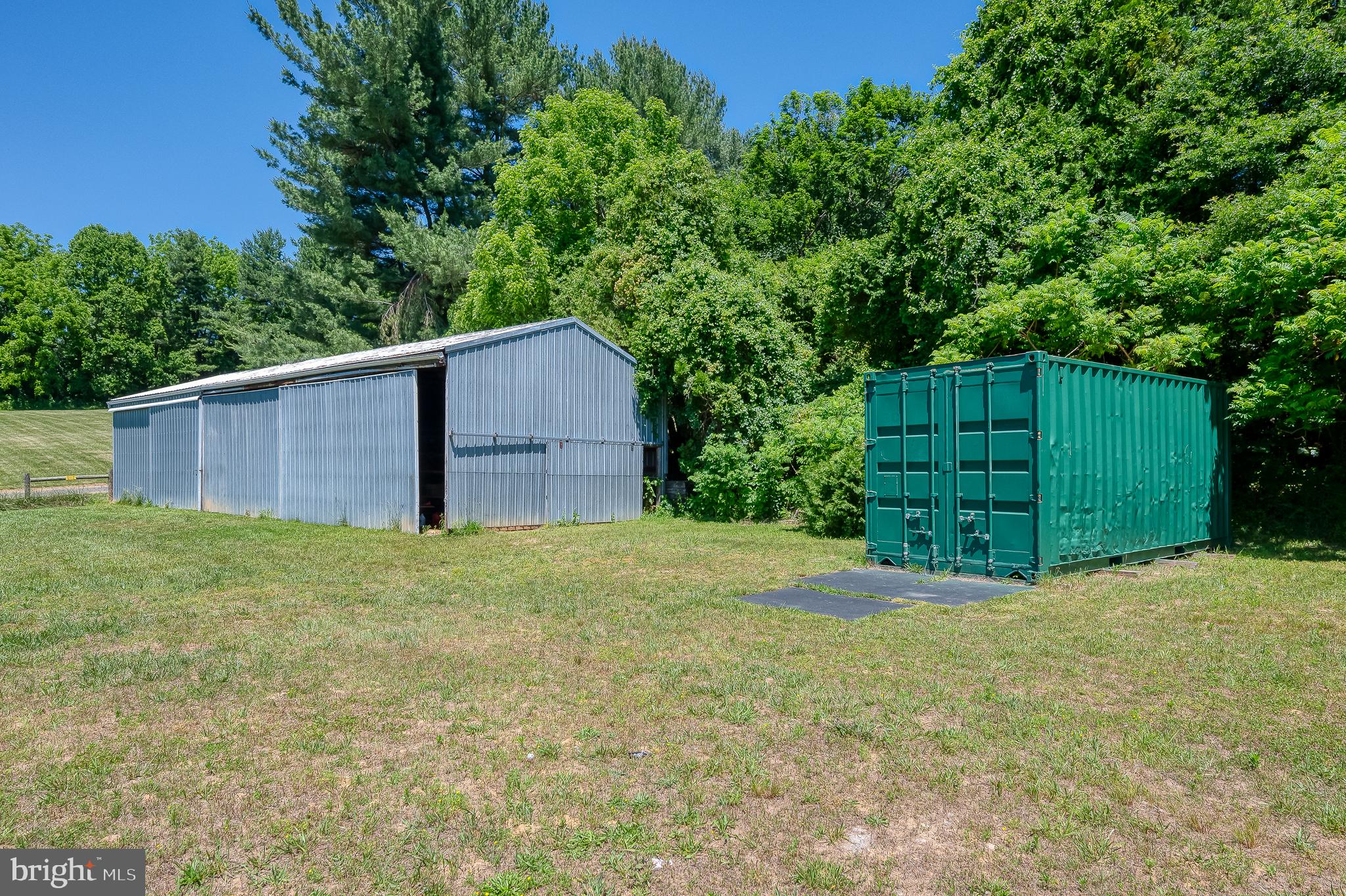 3248 Charles Street Fallston, MD 21047 - Photo 68 of 84 Rustic storage amidst lush greenery.