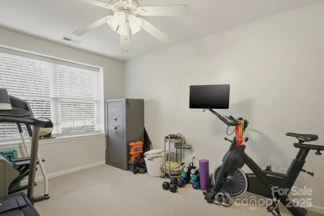 a view of a balcony with wooden floor
