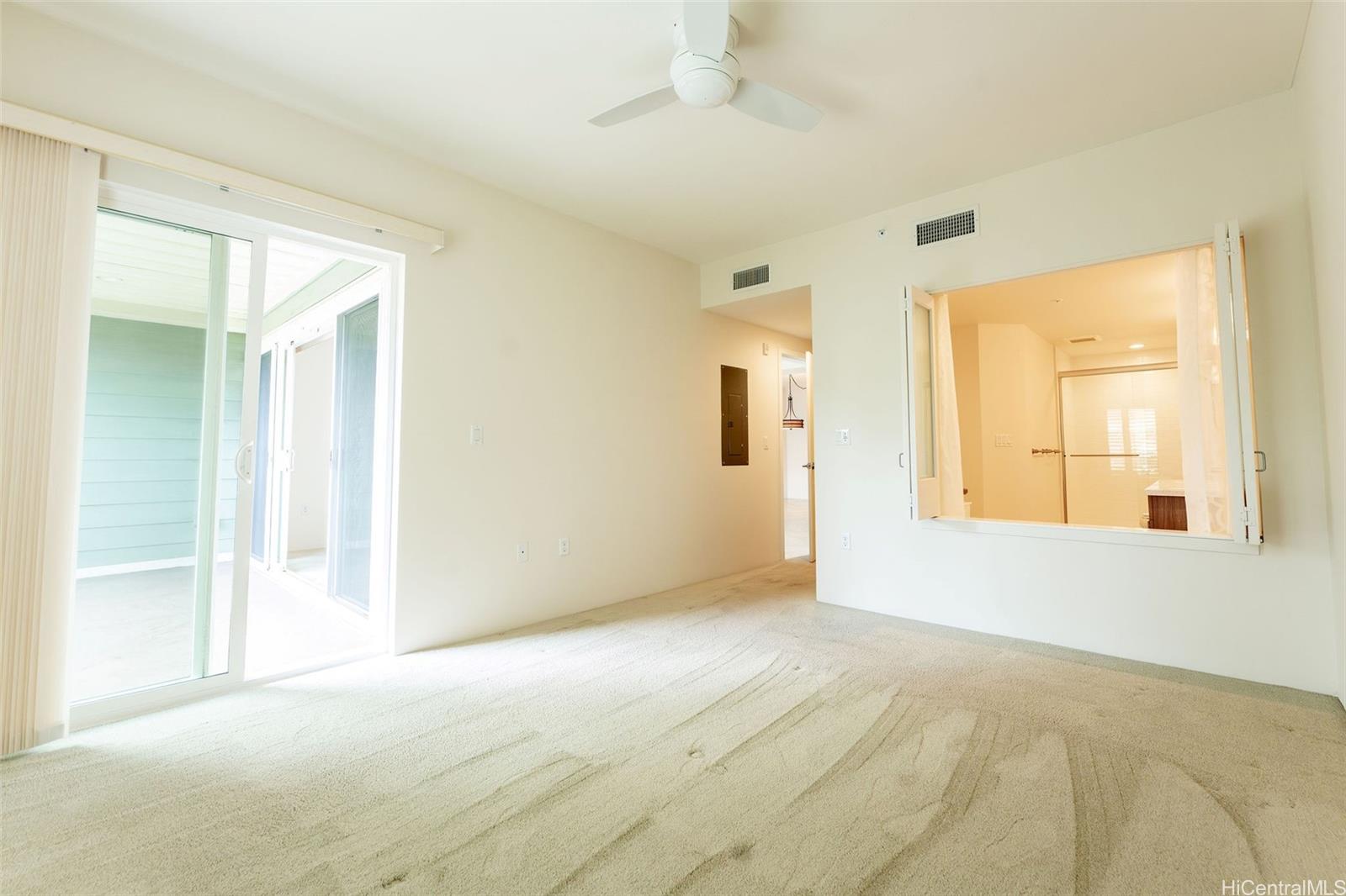 501 Kailua Road, Unit 1205 Kailua, HI 96734 - Photo 15 of 25 primary suite with access to the lanai, vacant