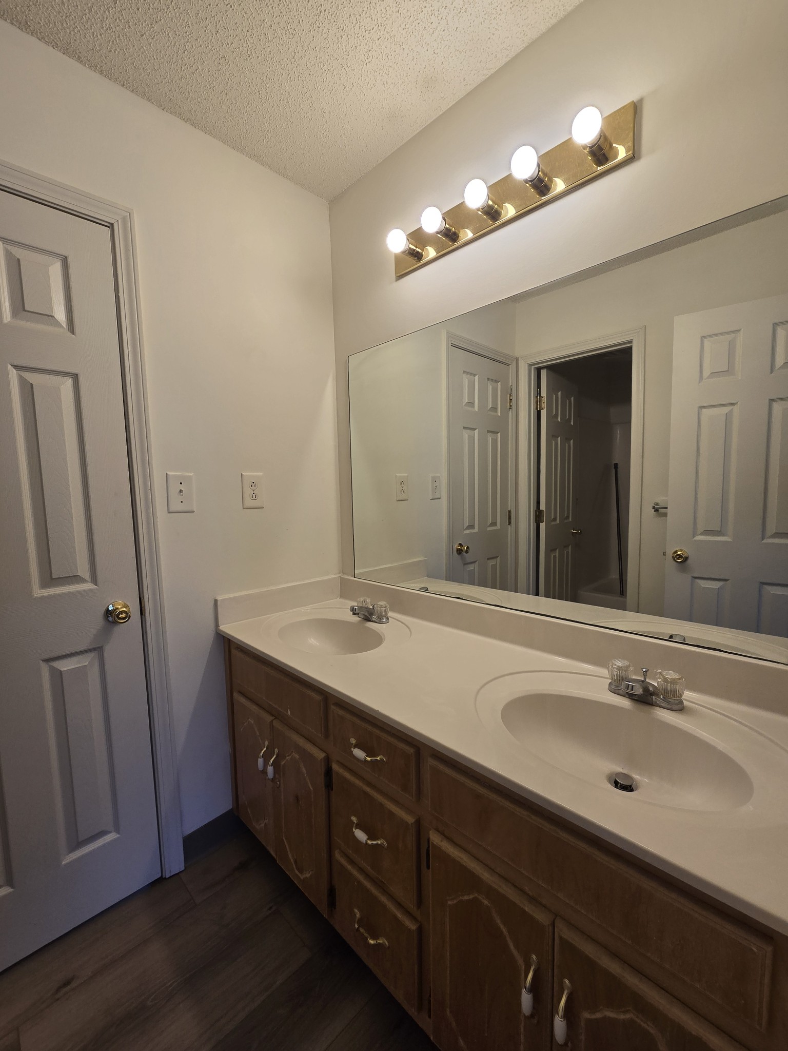 237 State Line Road Oak Grove, KY 42262 - Photo 17 of 20 a bathroom with a double vanity sink and a mirror