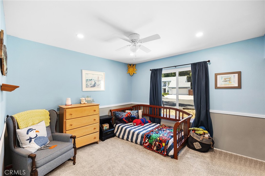 29951 Cactus Place Temecula, CA 92592 - Photo 20 of 46 a bedroom with a bed and wooden floor