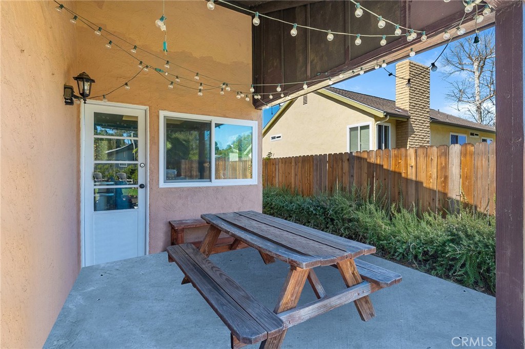 29951 Cactus Place Temecula, CA 92592 - Photo 21 of 46 a view of a house with backyard and sitting area