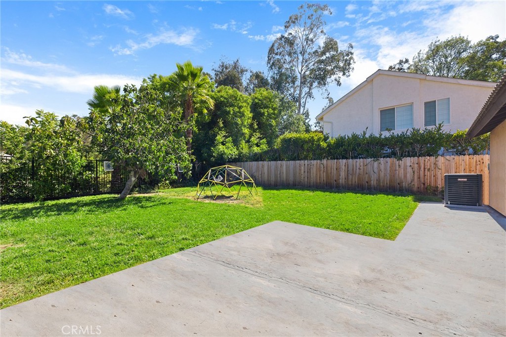 29951 Cactus Place Temecula, CA 92592 - Photo 24 of 46 a view of a house with a yard